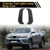 Black carbon fiber tail light lamp strip trim for 2022-2024 toyota tundra shown from the back side