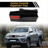 Black plastic center console organizer tray with red accent strips for Toyota Tacoma 2016-2023