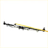 Black and silver metal center link tie rod with yellow tape for nissan crew cab 1997-2001 laid across it