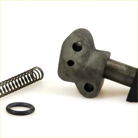 Dark gray metallic chain tensioner guide cam with three holes and shaft for datsun nissan 620 j15 engine 72-79