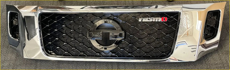 Chrome aftermarket grill for nissan navara nismo 2016-2020 with chrome finish black honeycomb mesh and red pathfinder lettering