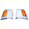 Pair of chrome corner indicator lights for toyota hilux 1988-1991 with clear lenses and orange turn signals