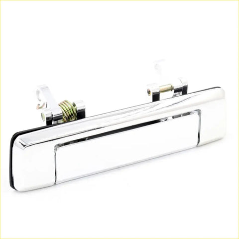 Chrome door handle for mazda bravo b2000 with sleek rectangular design and visible internal spring mechanism back view