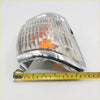 Chrome indicator corner light with clear ribbed lens and orange bulb for toyota hilux 6th gen 1997-2001