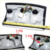 Back side of a gray plastic chrome rear tail light for mazda b series bravo with black rubber trim and five-pin connectors