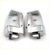 Pair of chrome side corner parking lights for nissan datsun navara d21 with clear ribbed lenses and mounting brackets