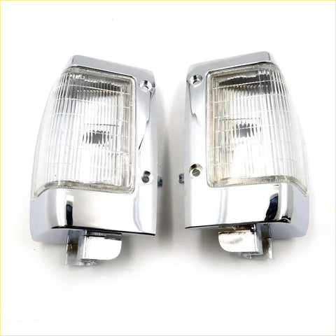 Pair of chrome side corner parking lights with clear ribbed lenses for nissan datsun navara d21 1985 1997