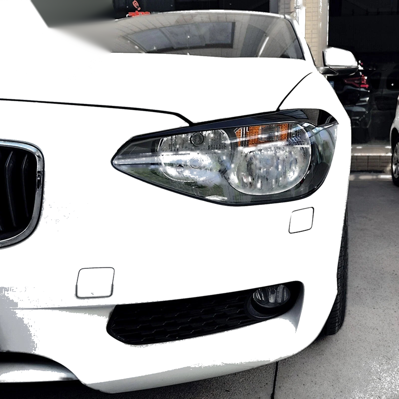 BMW 1 Series F20 F21 2 x Gloss Black Headlight Eyelid Trim Covers (11-14)