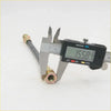 Brass-finished clutch hose line connector with black rubber sleeve measured by digital caliper for mazda b2000 series
