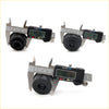 Black rubber cylindrical cabin mounting bushings for Toyota Hilux measured with digital calipers