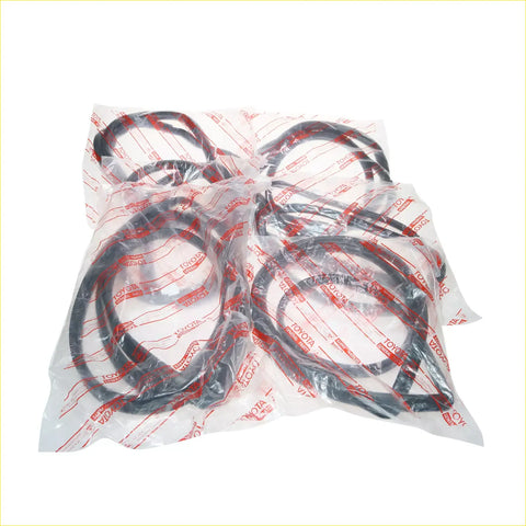 Black rubber weatherstrip gaskets in clear plastic with red toyota branding for hilux 4d 1988-1997