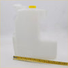 White plastic coolant reservoir tank with yellow cap for nissan frontier terrano navara np300 1997-2004 shown from backside
