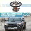 Silver coolant thermostat housing assembly with black rubber seal and copper spring for toyota pickup 1981-1985