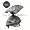Chrome finished corner turn signal light assembly with clear textured lens and black bracket for toyota land cruiser