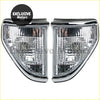 A pair of chrome-finished clear-lens side marker lights with angular design for toyota land cruiser prado 1990-1996