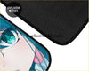 Black textured car floor mat featuring a vibrant anime character with teal eyes and blue hair from custom anime kawii lollipop floor mats