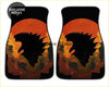 Black car floor mats with a bold godzilla silhouette against an orange and red sunset for custom godzilla floor mats