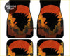 Black custom godzilla car floor mats with bold orange yellow sunset and spiky-haired silhouettes design