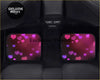 Custom hearts floor mats with pink and purple glowing heart decals on car interior windows for a fun vibe