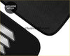 Custom japanese black asahi floor mat with textured surface and sleek silver geometric logo design for cars