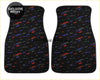 Black custom leopard floor mats with vibrant abstract multicolored streaks for car interiors