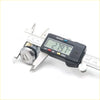 A shiny chrome finished cylindrical door lock cylinder being measured with a digital caliper for toyota hilux