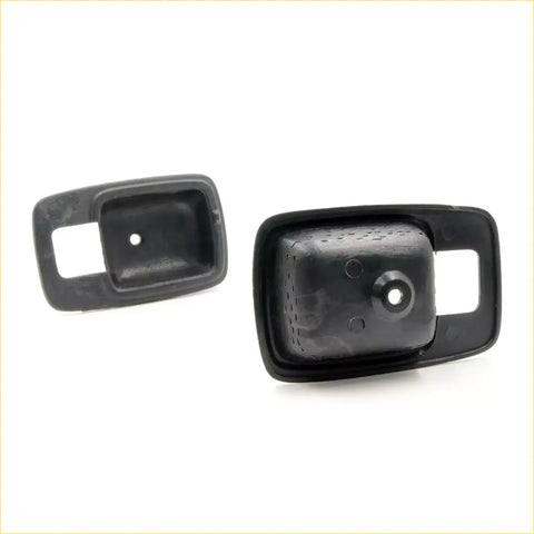 Black plastic door bezel cover with textured surface and mounting holes for Nissan Datsun 620 Ute 1972-1979
