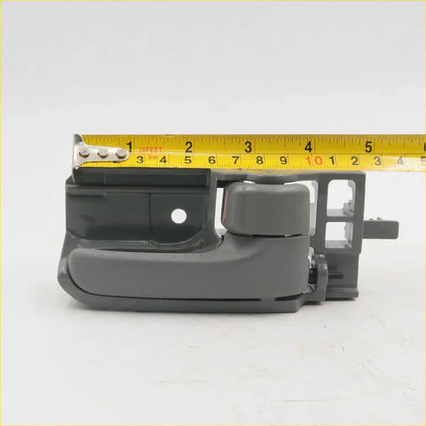 Gray plastic door handle assembly with molded grip and latch for toyota hilux sr5 mk6 ute 2005-2015 back side