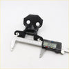 Black plastic door hinge for Toyota Hilux 1978-1983 with two circular holes and central hinge mechanism