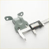 Gray plastic door hinge with two mounting flanges measured by digital caliper for mazda b series bravo