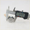 Shiny chrome door lock barrel with keyway slot for nissan platina grado sedan 2002-2010 shown with digital calipers