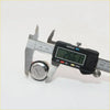 A sleek silver-toned cylindrical door lock and key with keyhole measured by digital caliper for nissan datsun models