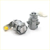 Backside of gray metallic door lock cylinders with yellow and white plastic parts for toyota hilux ute 2001-2004