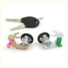 Two chrome door lock cylinders with pink and green parts and black key fobs for nissan datsun 720 navara ute 1980-1997