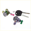 Two metallic door lock cylinders with colored plastic levers and keys for nissan x-trail t30 2000-2007
