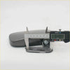 Gray plastic door mirror housing with metallic screw and caliper measuring width for dodge chrysler plymouth cars