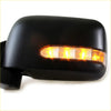 Black plastic side mirror with amber turn signal lights for nissan d22 navara terrano 1997-2004 shown from the back side