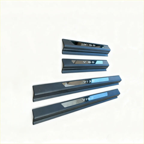 Set of four black vigo car door sill protectors with sleek metallic finish and logo for toyota hilux 2005-2015