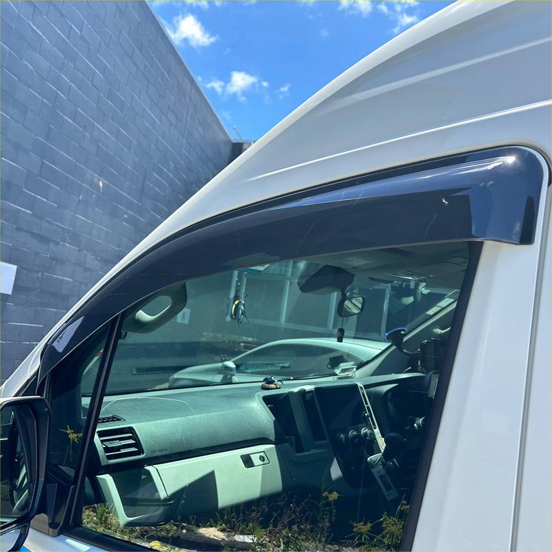 Black plastic door visors weather shields installed on white 2019+ toyota hiace window for weather protection