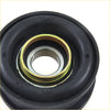 Black rubber vibration damper with a metallic inner bearing assembly and gold-colored retaining ring.