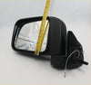 Black plastic electric door mirror for nissan navara d22 with reflective glass and visible wiring seen from the back side