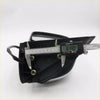 Black plastic electric door mirror housing with metallic fasteners and digital caliper for toyota hilux kun26 sr5 back side