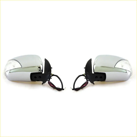 Chrome finished electric led door wing mirrors with integrated turn signals and black mounts for toyota hilux 2004-2015