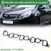 Black rubber engine intake manifold gasket with circular and rectangular cutouts for toyota hilux 2004