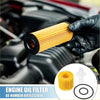 Yellow cylindrical engine oil filter with black caps and o ring held by gloved hand for Toyota C-HR 2018