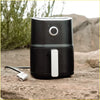 Black air fryer with white handle and control dial featuring sleek cylindrical design for family outdoor kitchen use