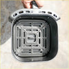 Gray plastic air fryer basket with handle and vented interior for family outdoor kitchen perfect for 4wd and ute trips