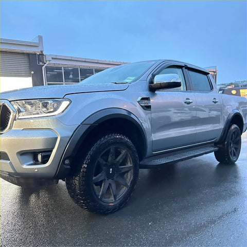 Silver ford ranger px3 2019-2021 with black wheels and side steps featuring smooth style 4-inch fender flares with senor