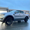 Silver ford ranger px3 pickup truck with 4-inch smooth style fender flare black wheels and side steps front view