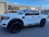 White ford ranger px2 2016-2018 with matte black 6-inch smooth style fender flares black wheels and side steps
